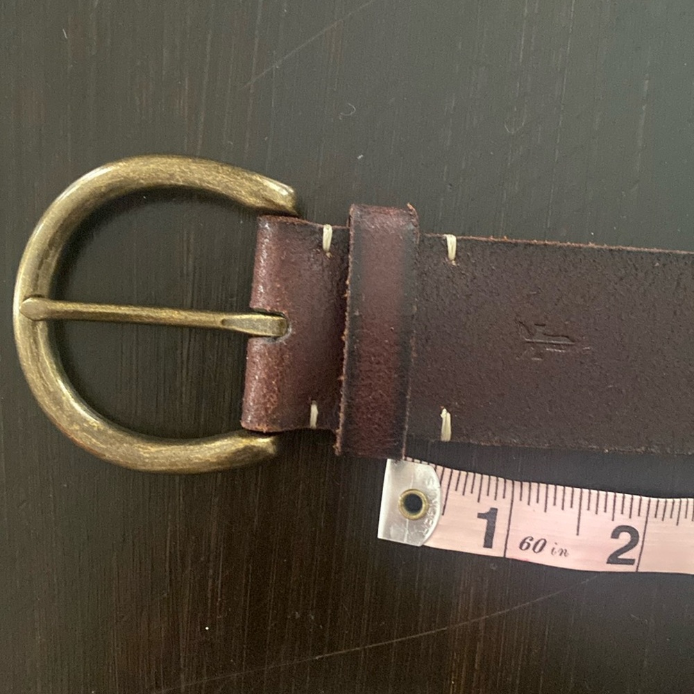 Frye Belt. Size medium. Dark brown genuine leather. NWOT.